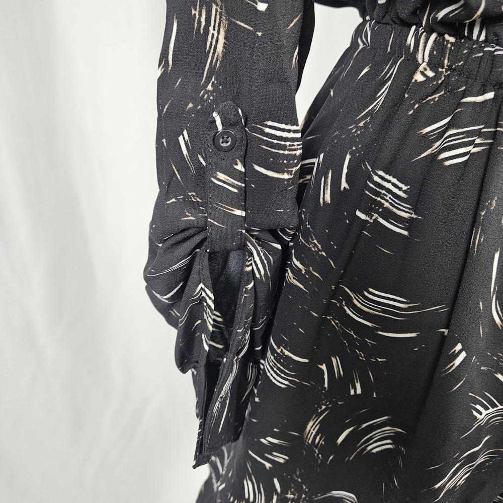 Elegant Black Patterned Dress with Pockets Size 6 photo 3