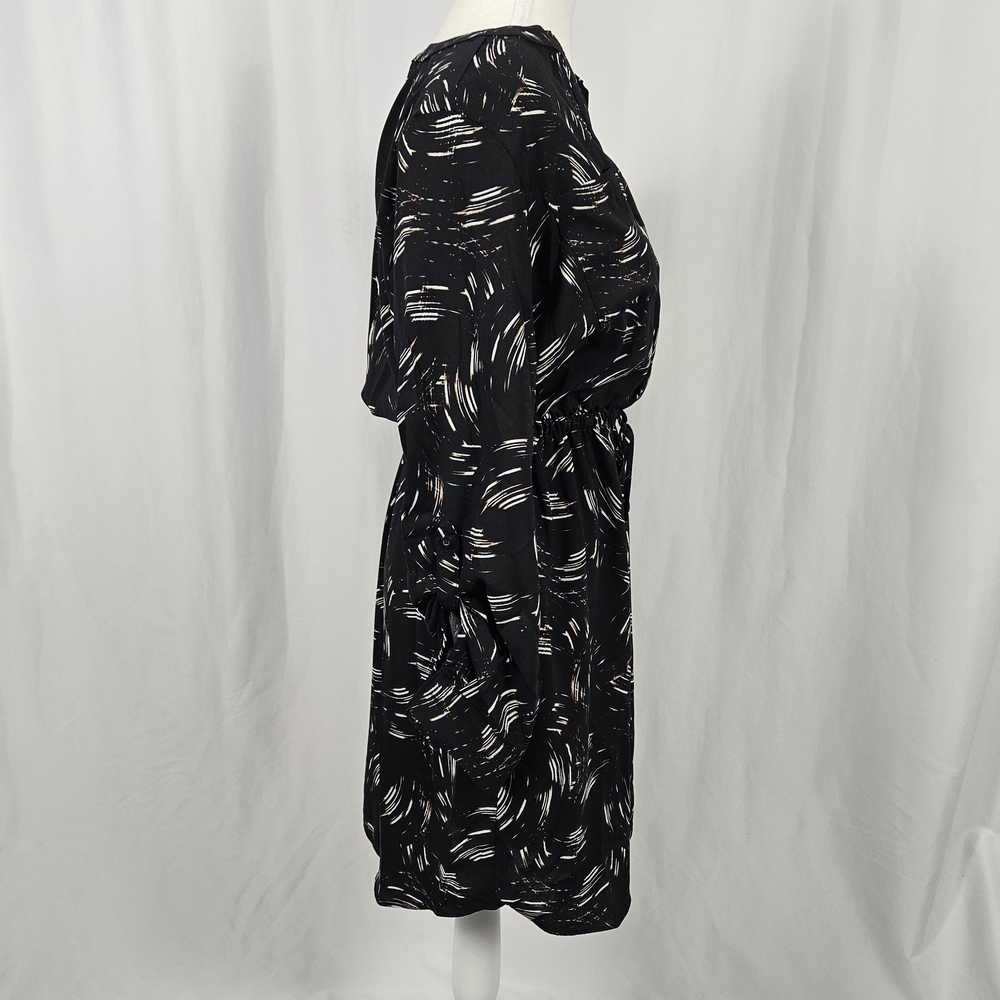 Elegant Black Patterned Dress with Pockets Size 6 photo 6
