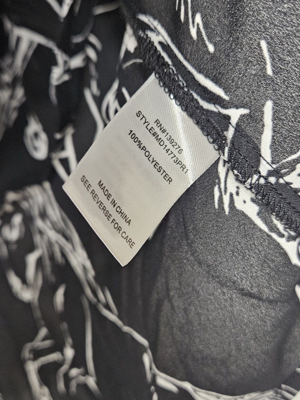 Black Horse Print V-Neck Blouse photo 4