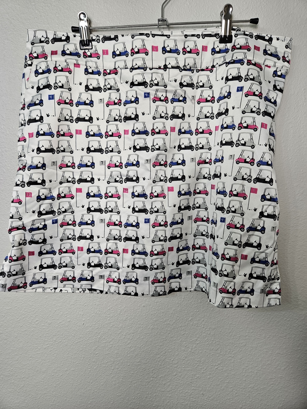 Izod White Skort with Blue, Black and Pink Golf Carts Print Size 10