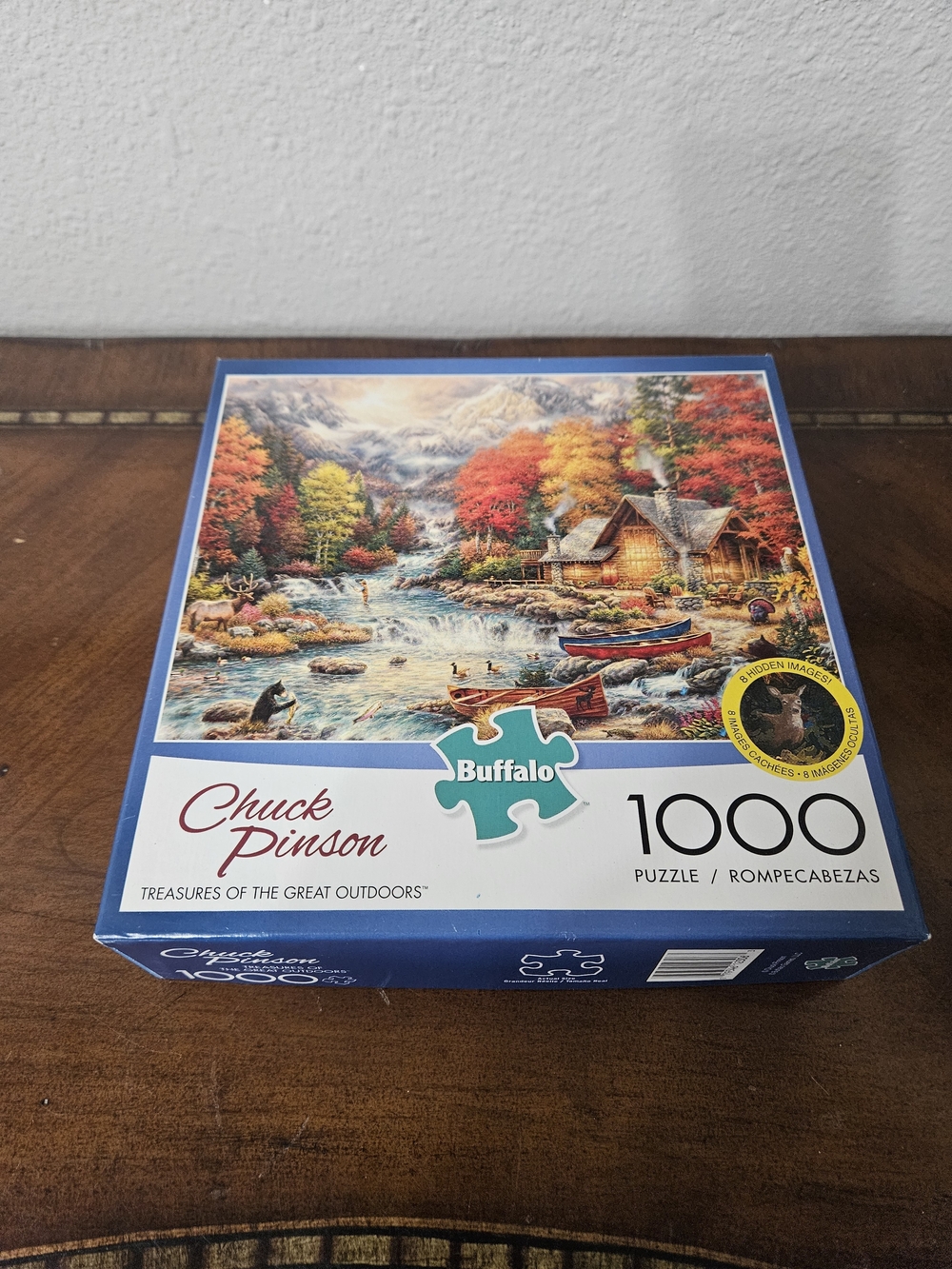 Buffalo Chuck Pinson 1000-Piece Puzzle - Scenic Cabin River (Blue/Multicolor)